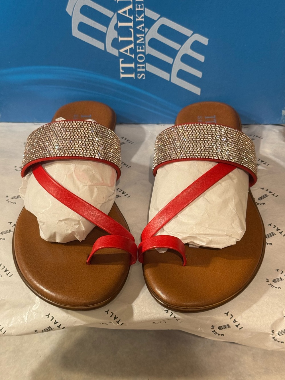 Italian Shoemakers Ryann sandals featuring red straps rhinestone embellishments